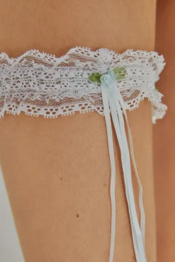 Liga Ivette Bridal encaje detalle flor