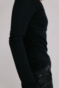 Magnolia. Top escote asimétrico