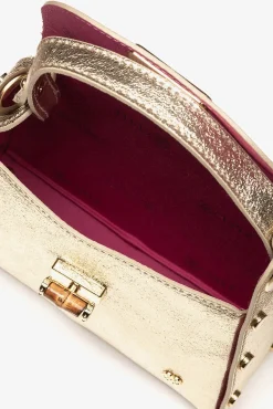 Mini bolso tachas piel