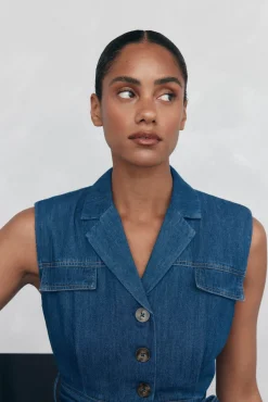 Mono pata recta detalle bolsillos