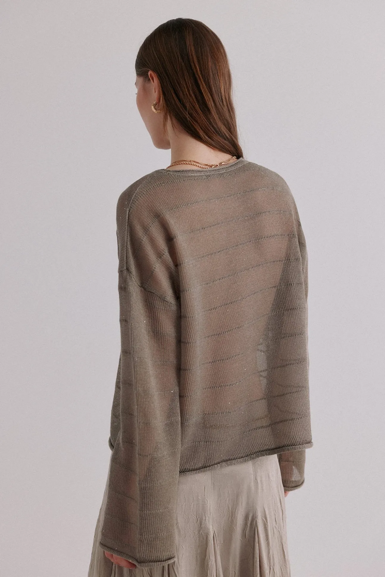 Nicole. Jersey con lentejuelas