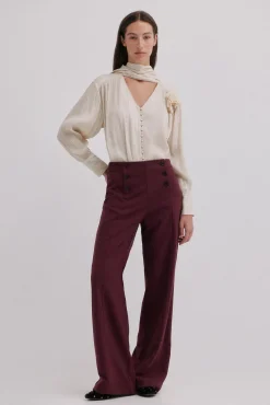 Pam. Pantalones con doble abotonadura