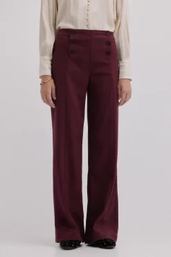 Pam. Pantalones con doble abotonadura