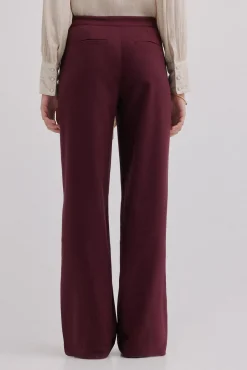 Pam. Pantalones con doble abotonadura