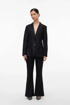 Pantalón acampanado efecto encaje