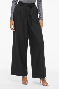 Pantalón ancho de vestir con cinturón flor