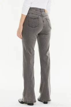 Pantalón denim bolsillos plastrón