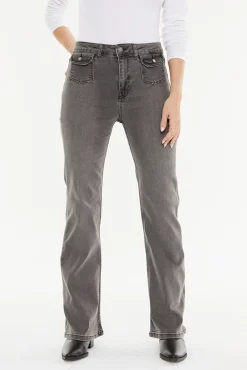 Pantalón denim bolsillos plastrón