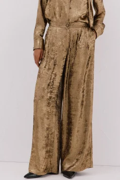 Pantalón dorado palazzo