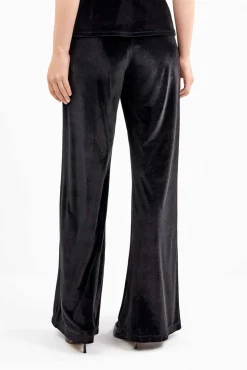 Pantalón largo de terciopelo elástico con diseño elegante