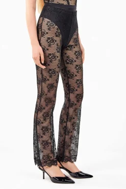 Pantalón largo elástico de encaje floral transparente y delicado