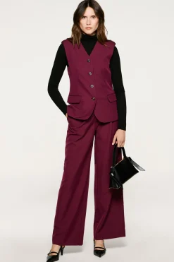 Pantalón traje pinzas.