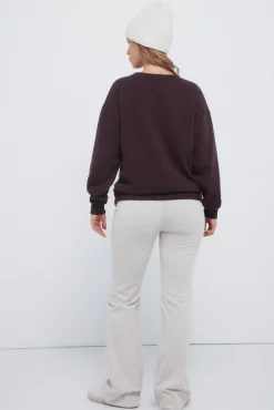 Pantalones pana low flare