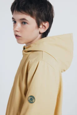 Parka amarillo pastel niño