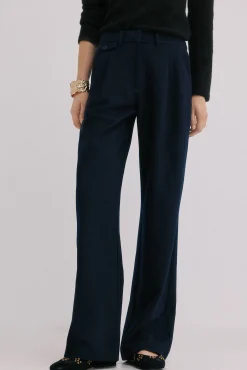 Peggy. Pantalones con pliegues