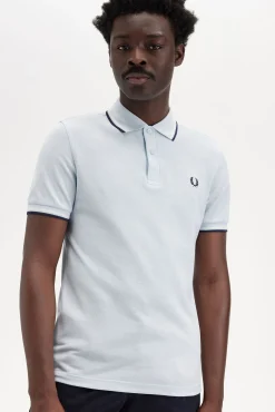 Polo con ribete con dos franjas