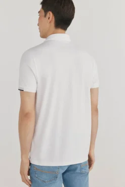 Polo puños contraste