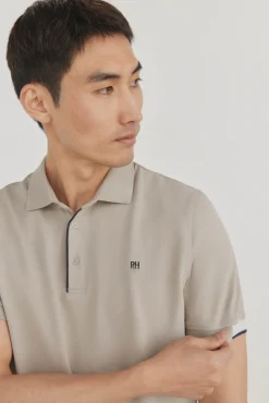 Polo puños contraste