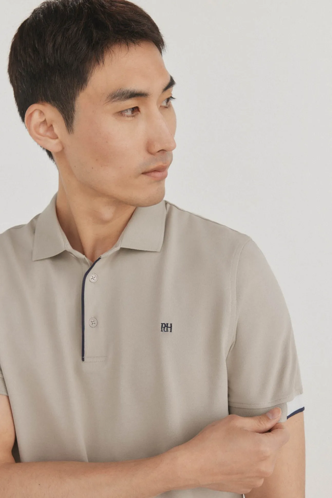 Polo puños contraste