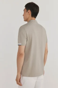 Polo puños contraste