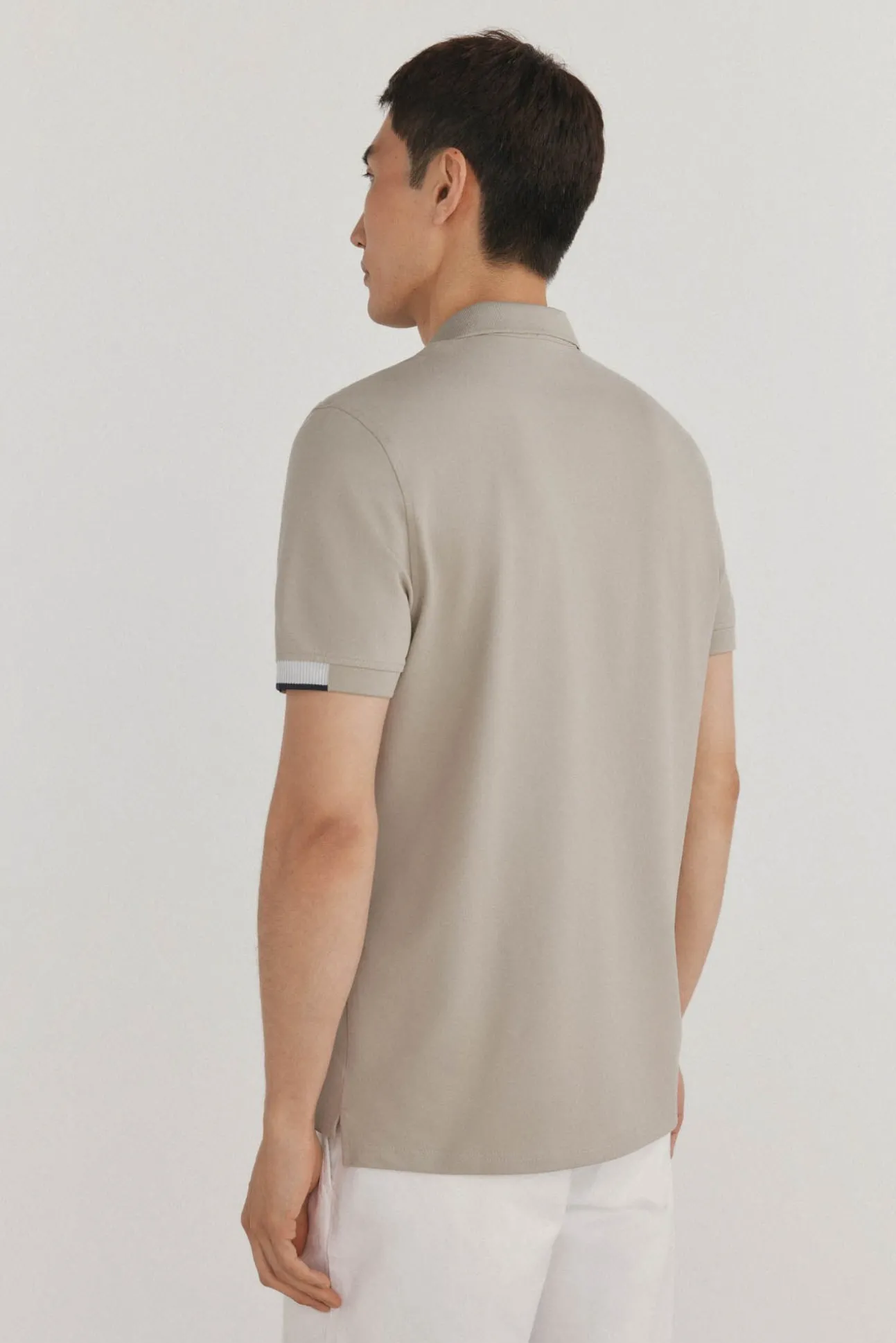 Polo puños contraste