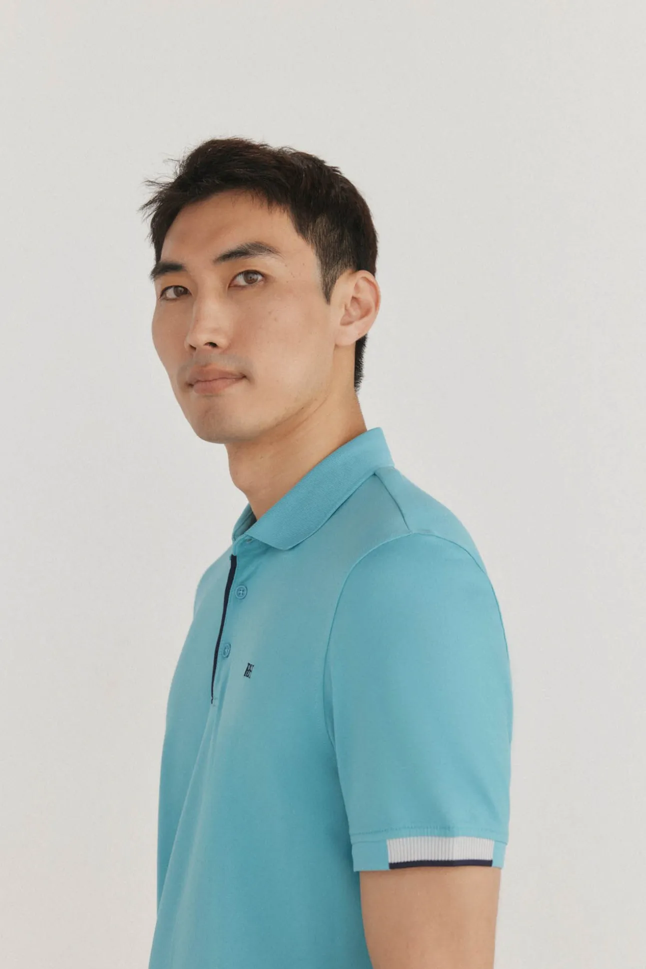 Polo puños contraste