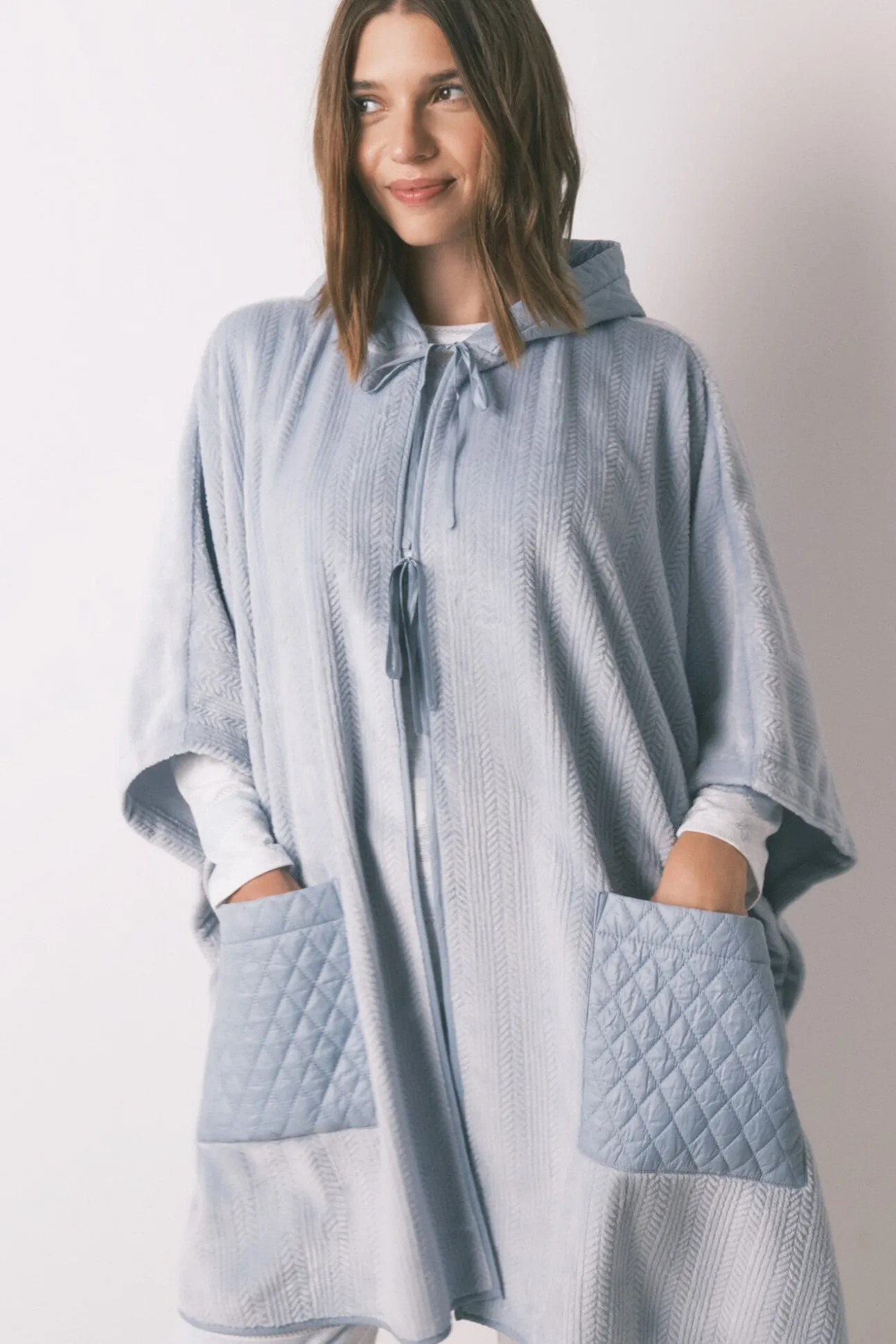 Poncho corto polar relieve azul