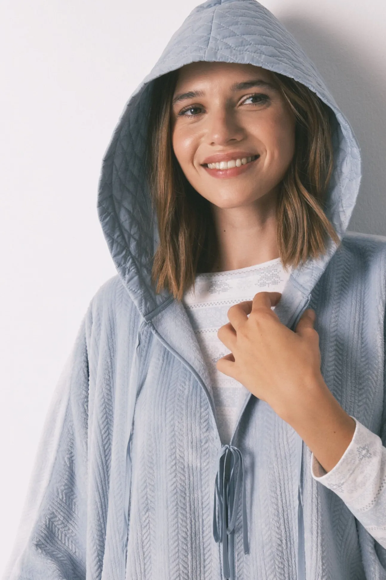 Poncho corto polar relieve azul