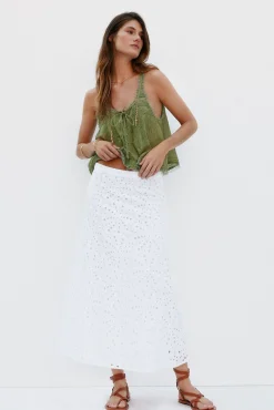 Regina. Falda perforada