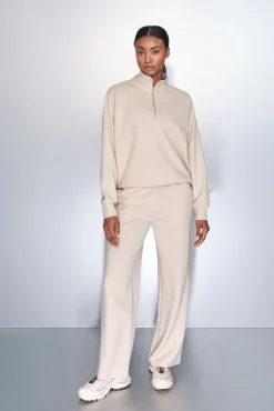 Sudadera cuello cremallera beige