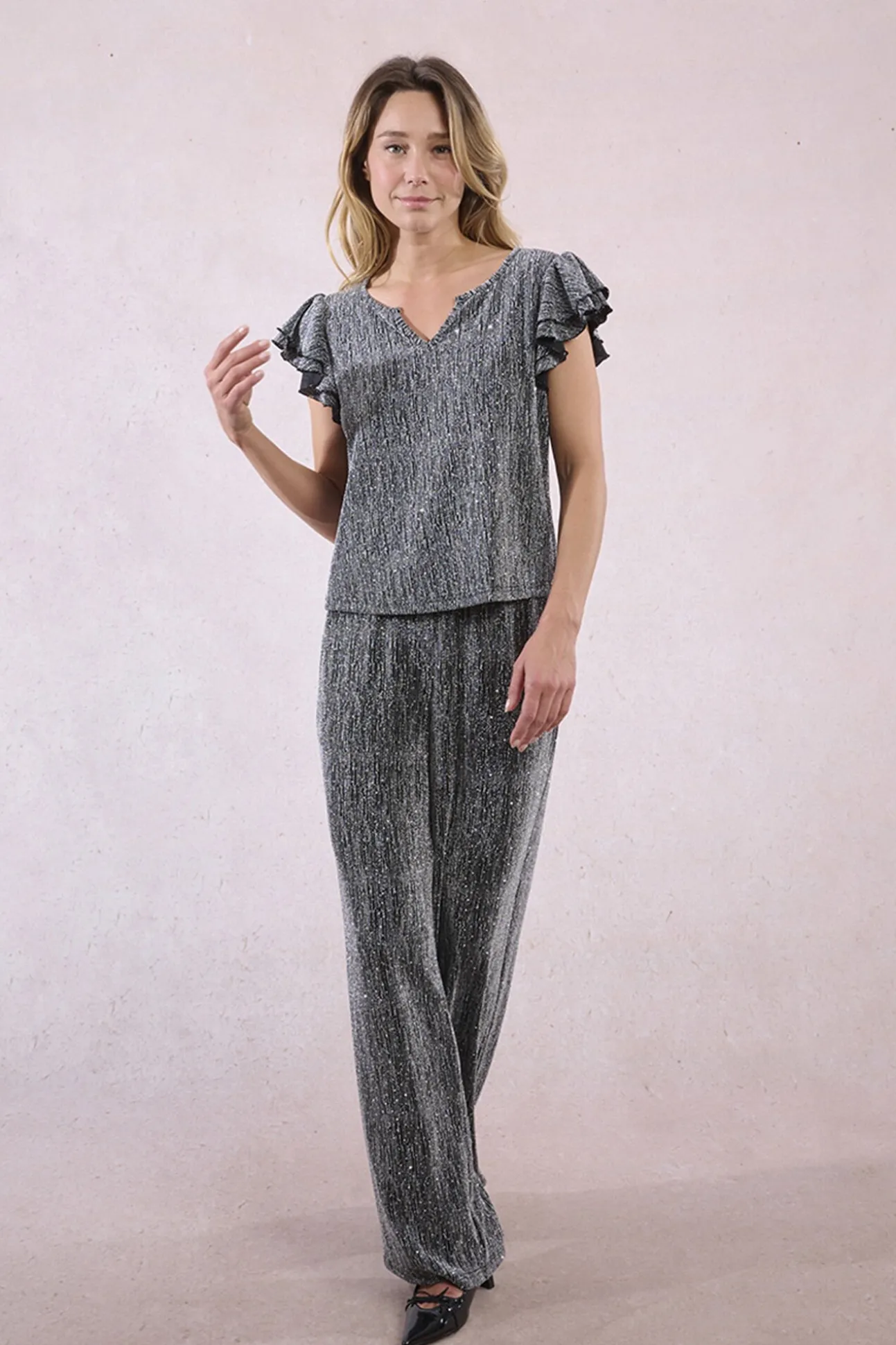 Top de manga corta detalle volantes