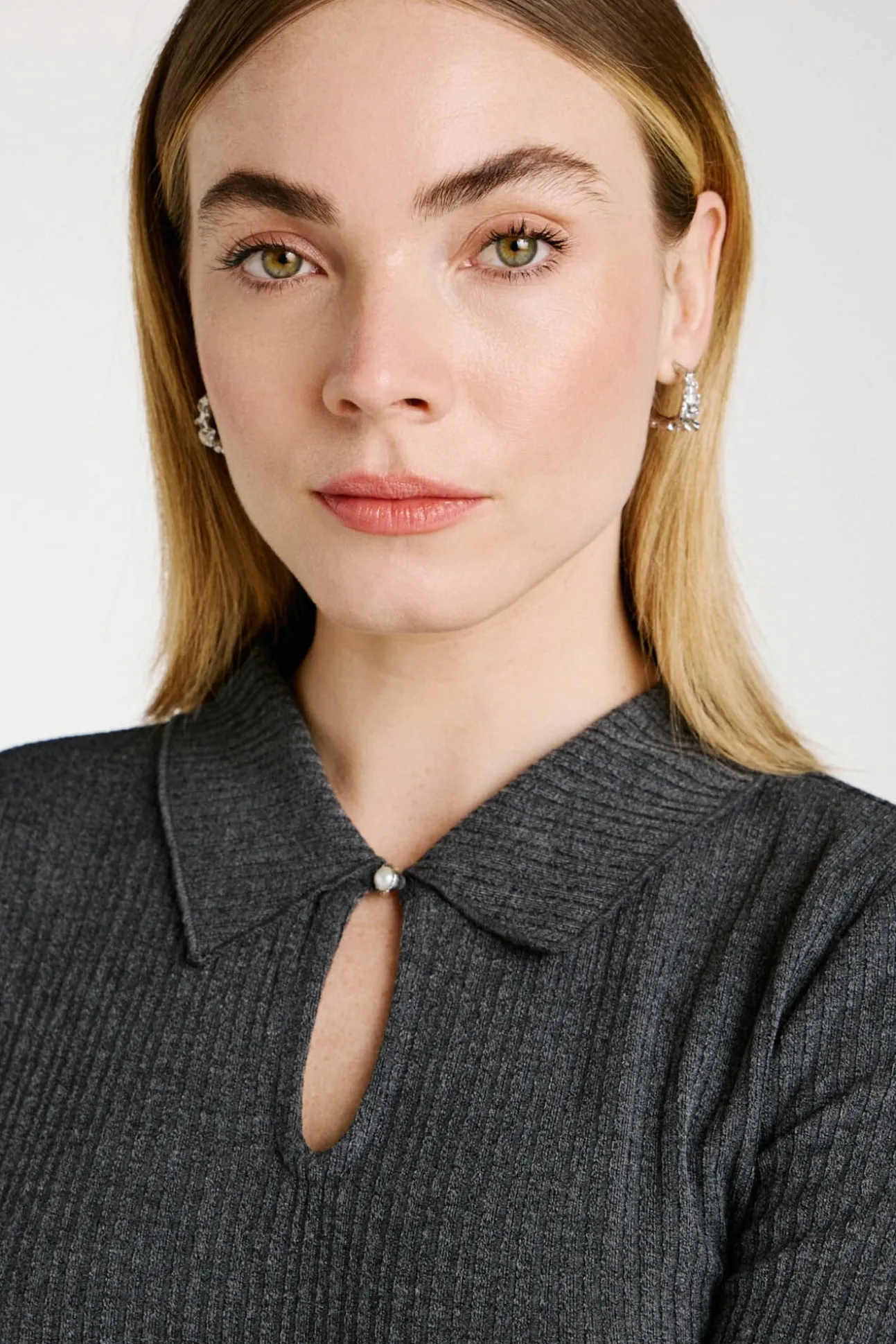 Top de manga larga con cuello polo