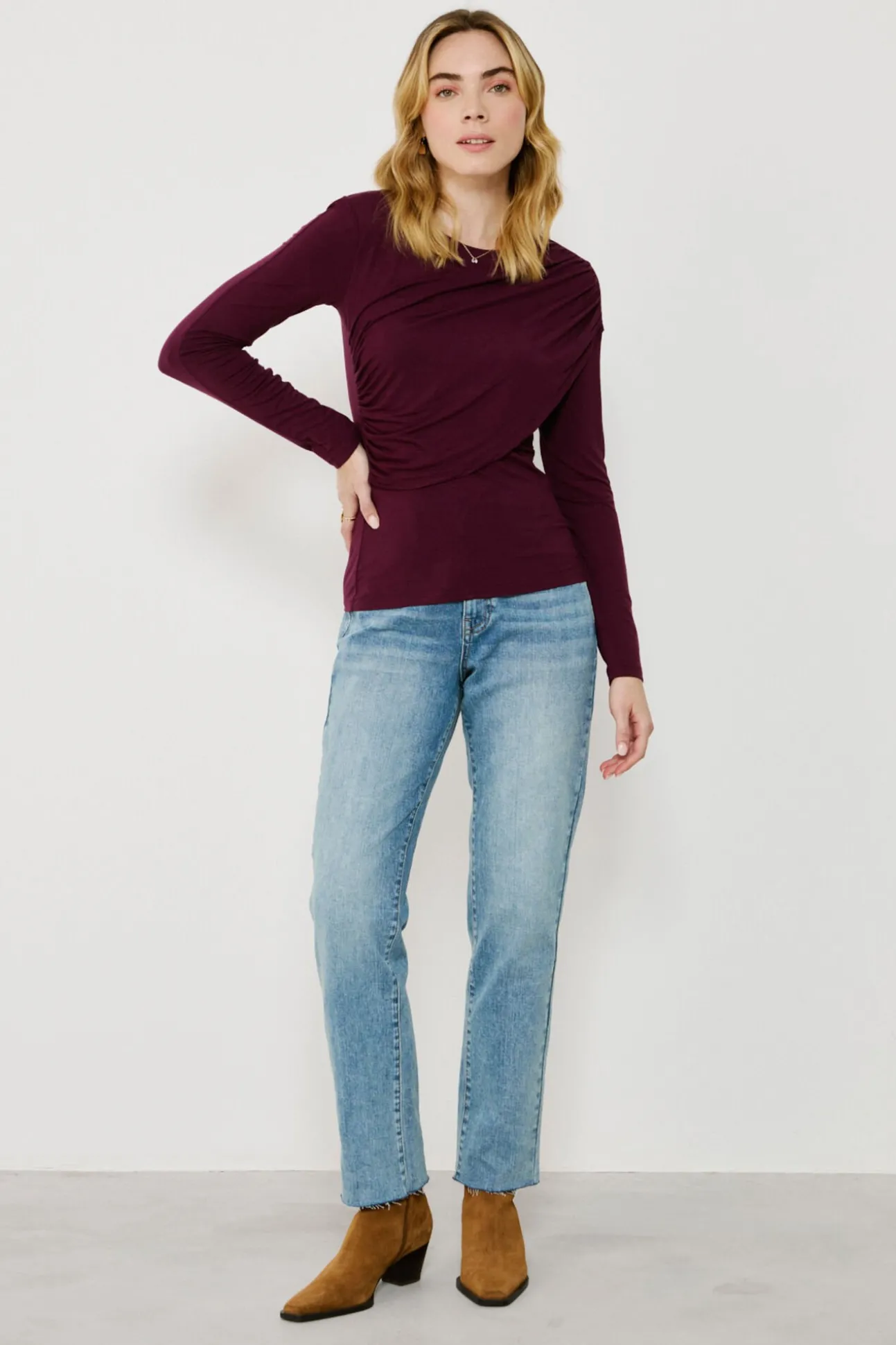 Top de manga larga con detalle drapeado