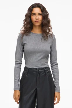 Top de manga larga con glitter