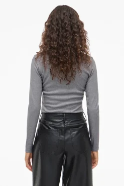 Top de manga larga con glitter