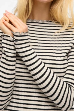 Top de manga larga con ribetes