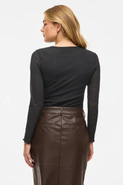 Top de manga larga con textura