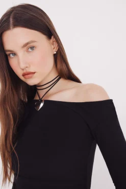 Top escote asimétrico