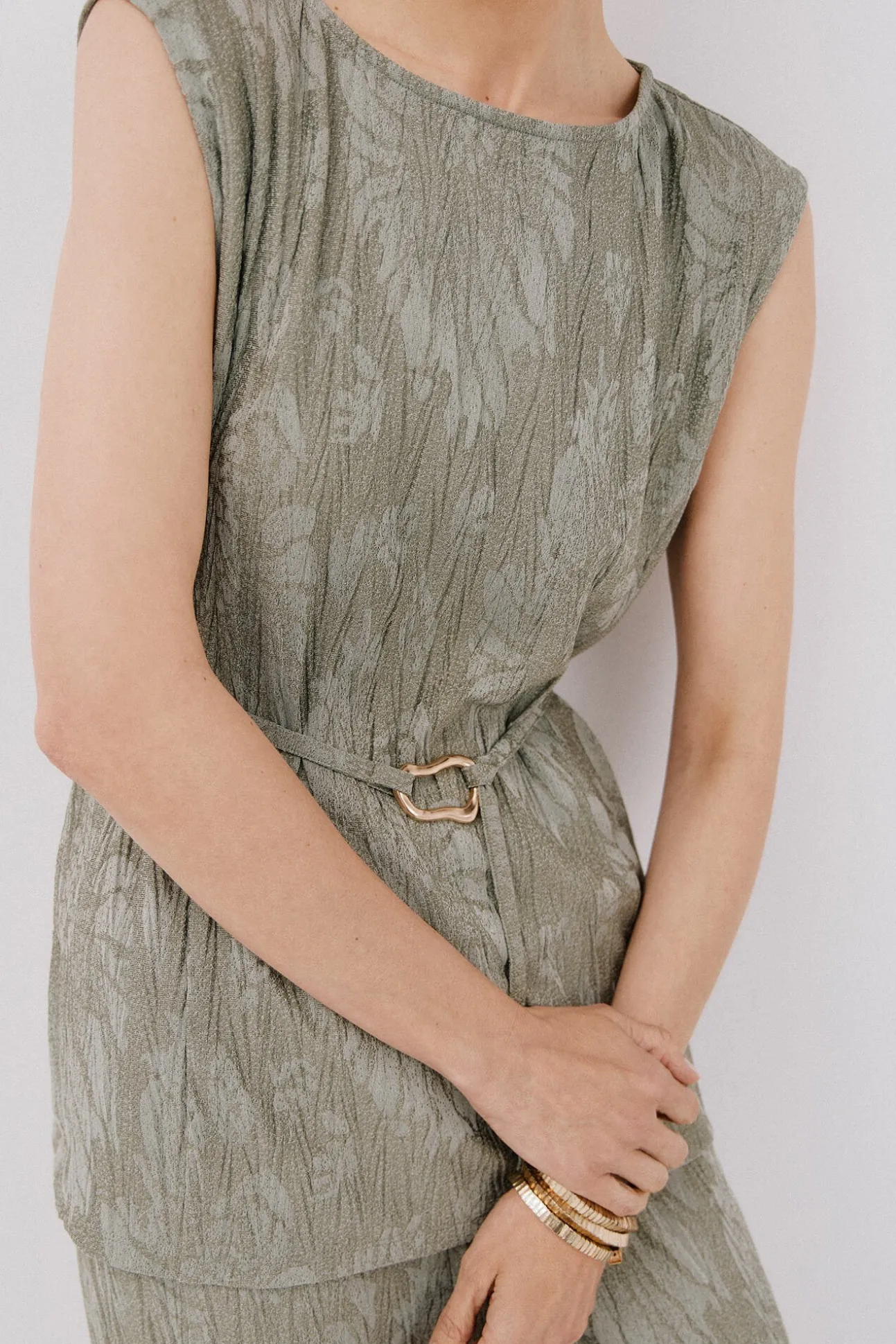 Top jacquard hebilla