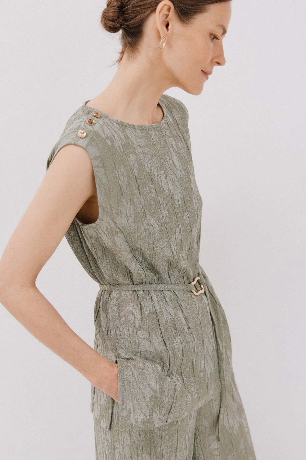 Top jacquard hebilla