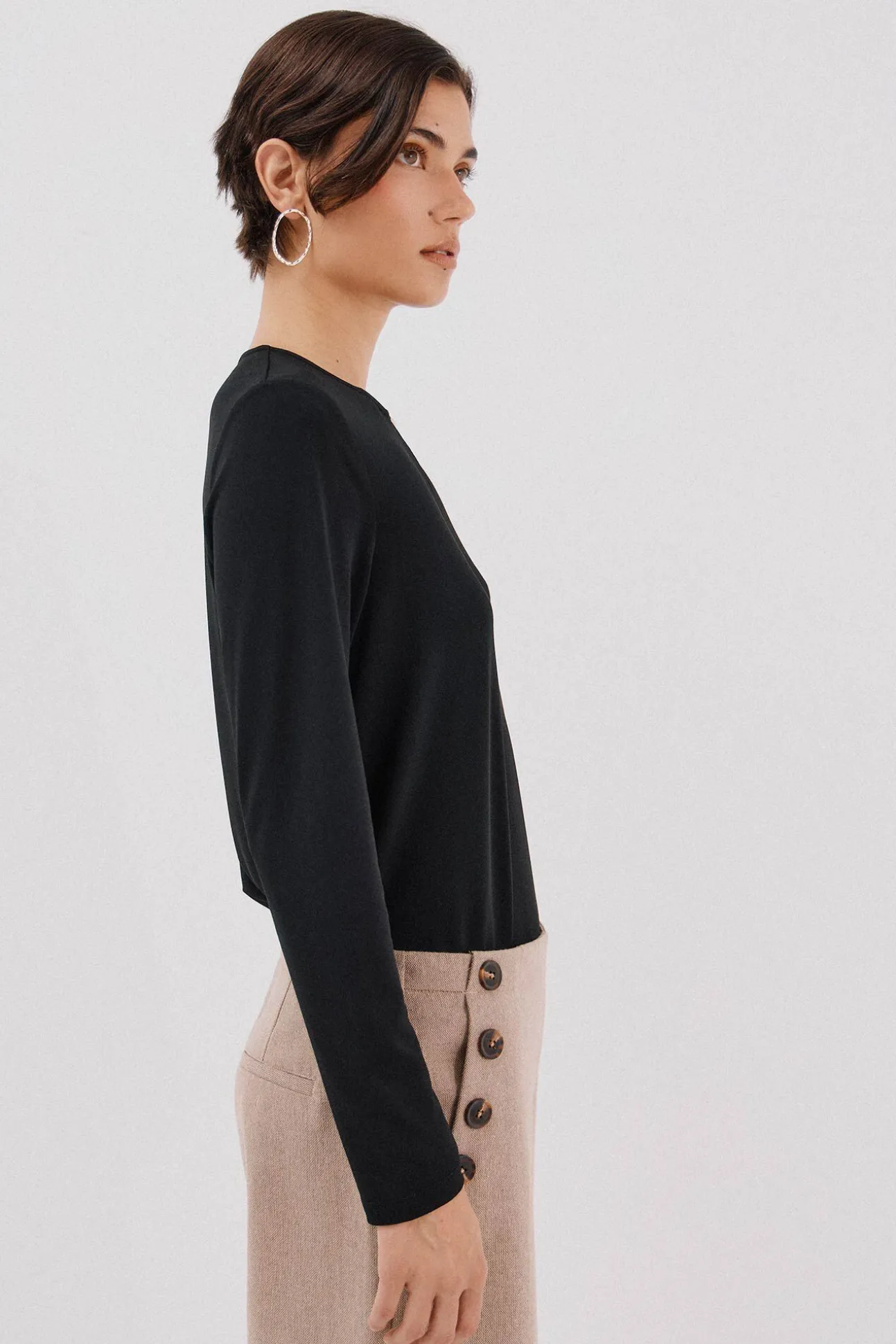 Top pieza dorada escote