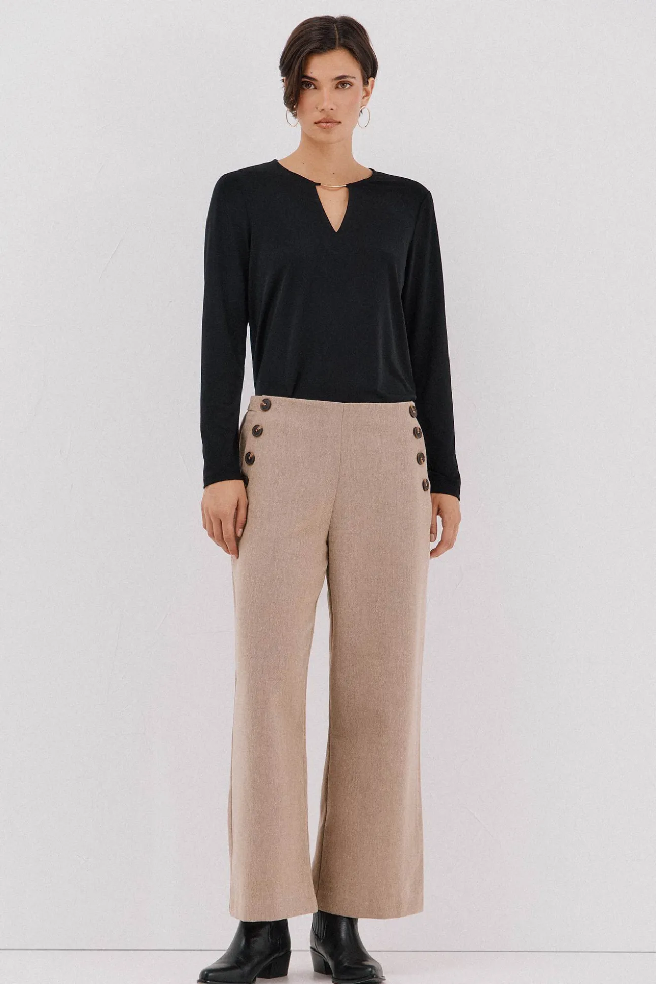 Top pieza dorada escote