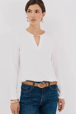 Top pieza dorada escote