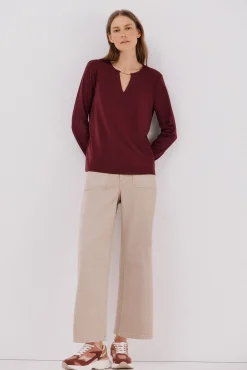 Top pieza dorada escote