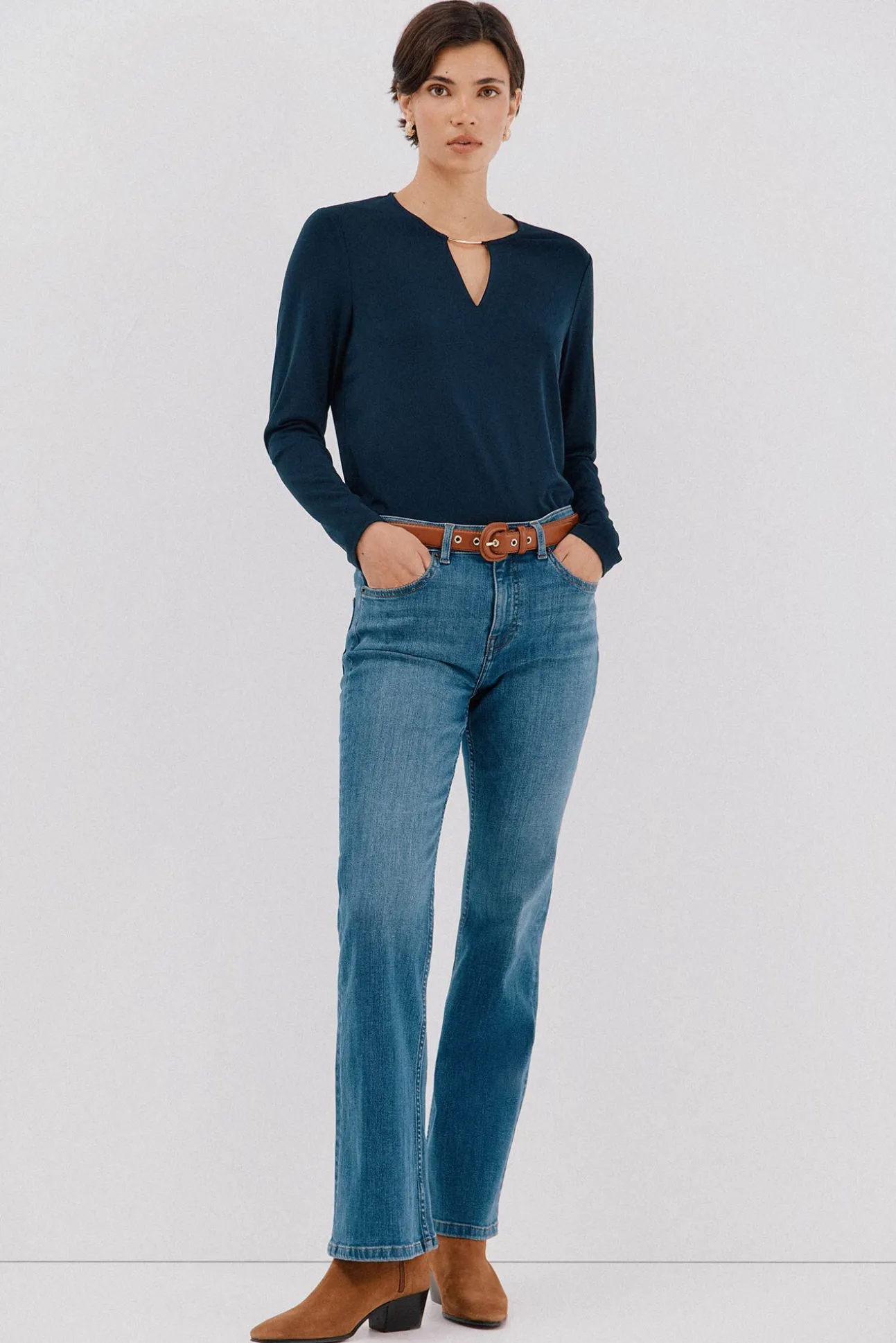 Top pieza dorada escote