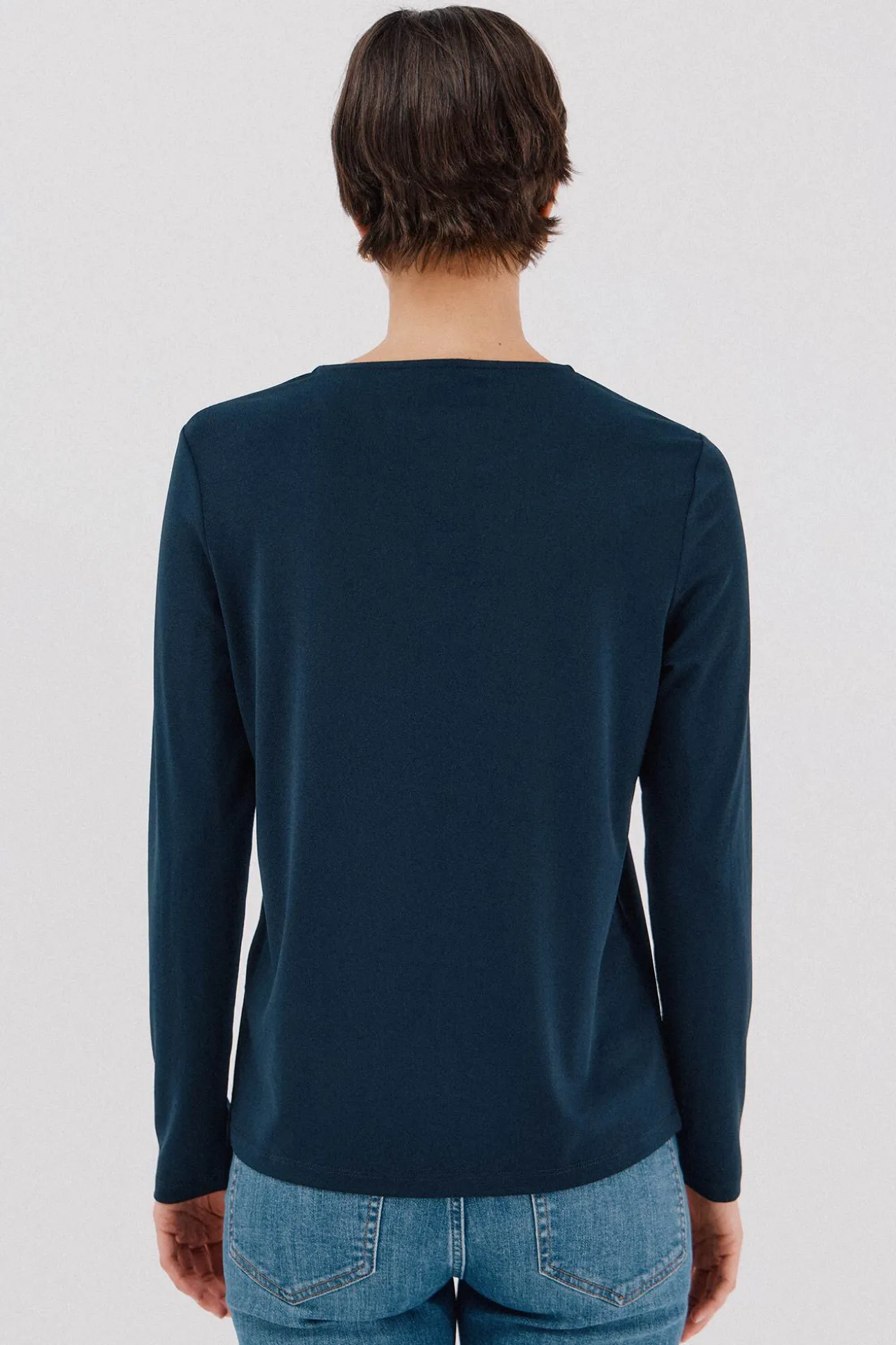 Top pieza dorada escote