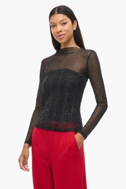 Top transparente con purpurina