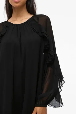 Vestido corto con volantes