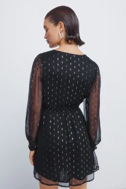 Vestido corto detalles lurex