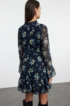 Vestido mini volantes